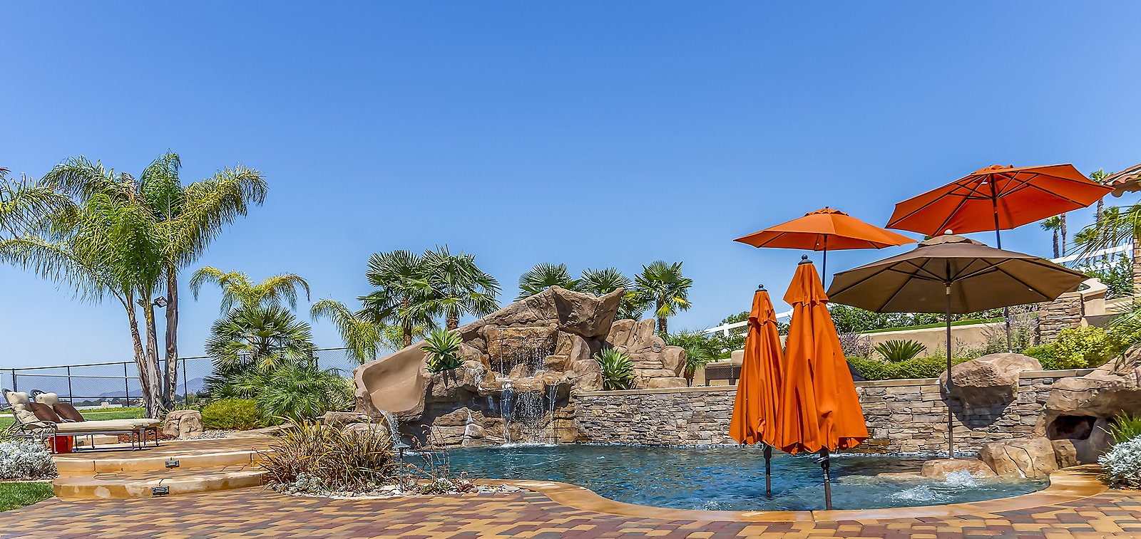 THE HENSLEY GROUP REAL ESTATE - swimming pool w/ beautiful landscape