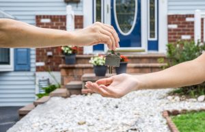 Handing Over the Key from a New Home